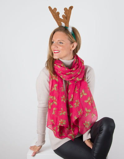 Image Showing a Fuchsia Pink Christmas Scarf With Holly Print