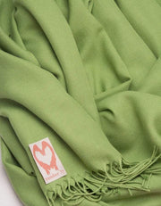 an image showing a close up of a pistachio green pashmina 